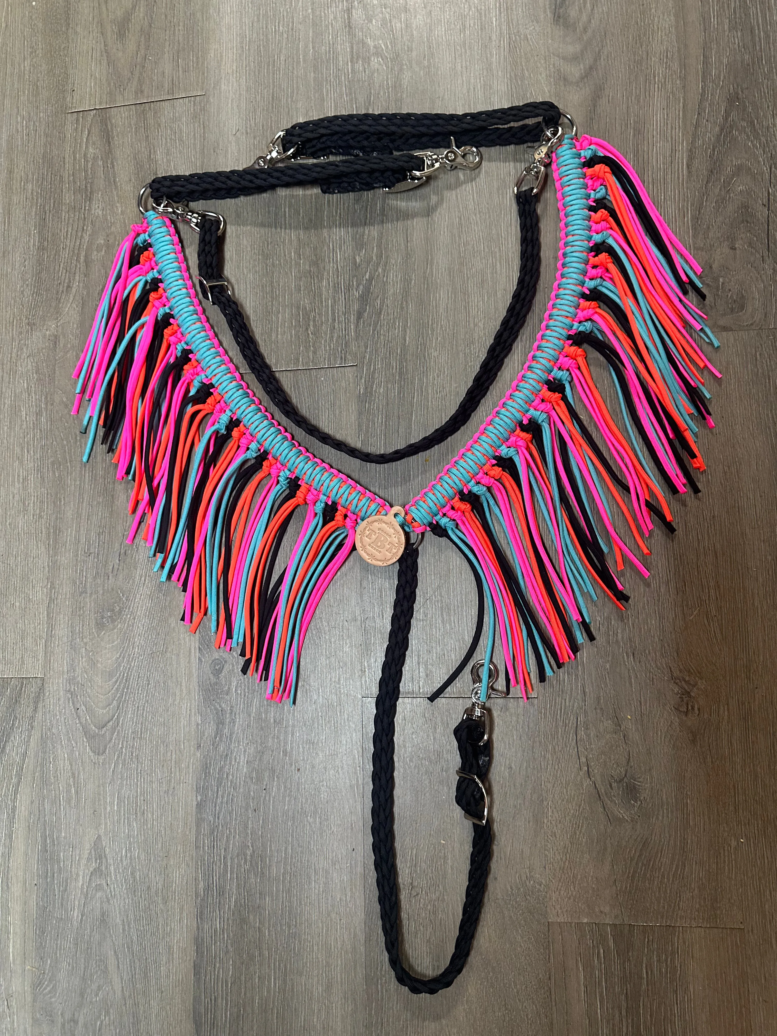 fringe breast collar hot pink,  black,turquoise, and orange  with a wither strap