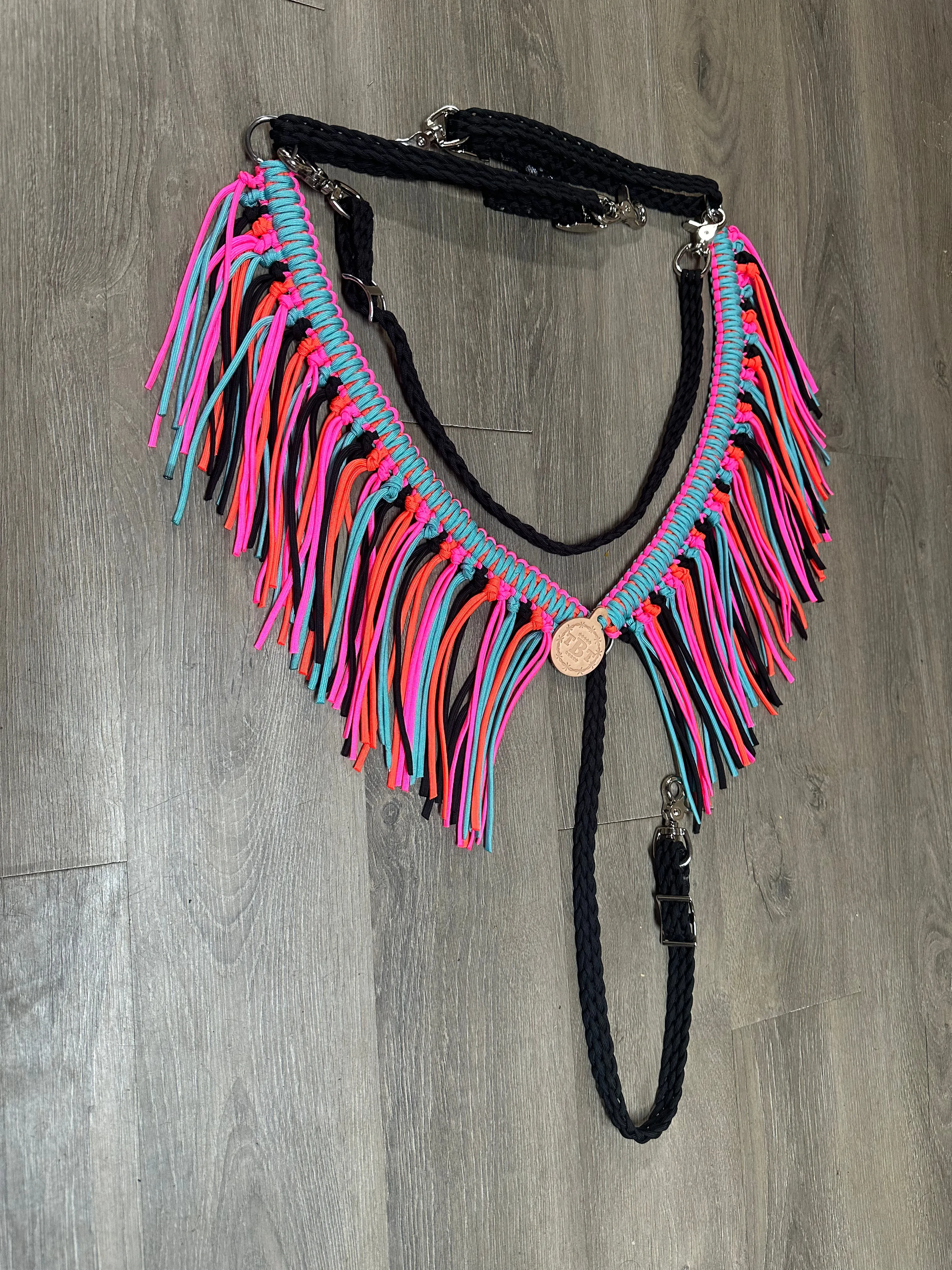 fringe breast collar hot pink,  black,turquoise, and orange  with a wither strap