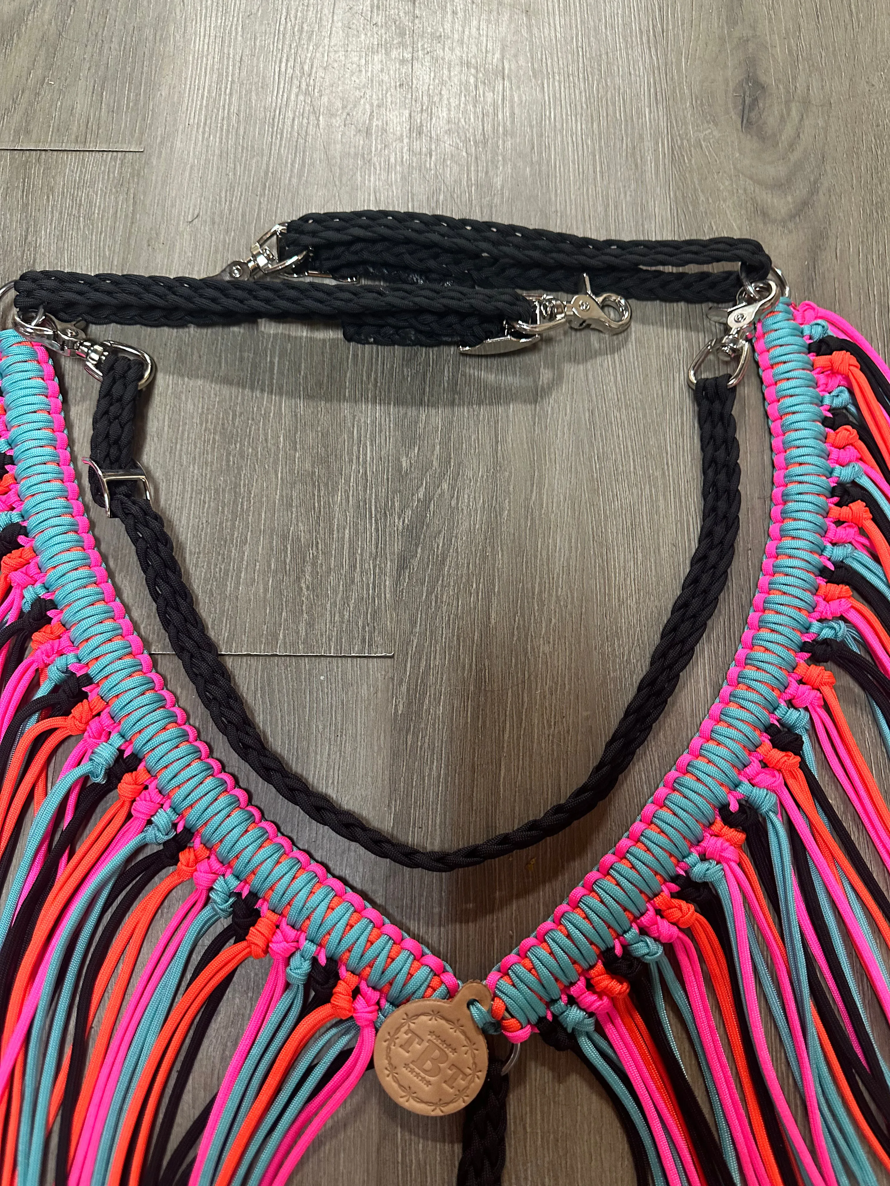 fringe breast collar hot pink,  black,turquoise, and orange  with a wither strap