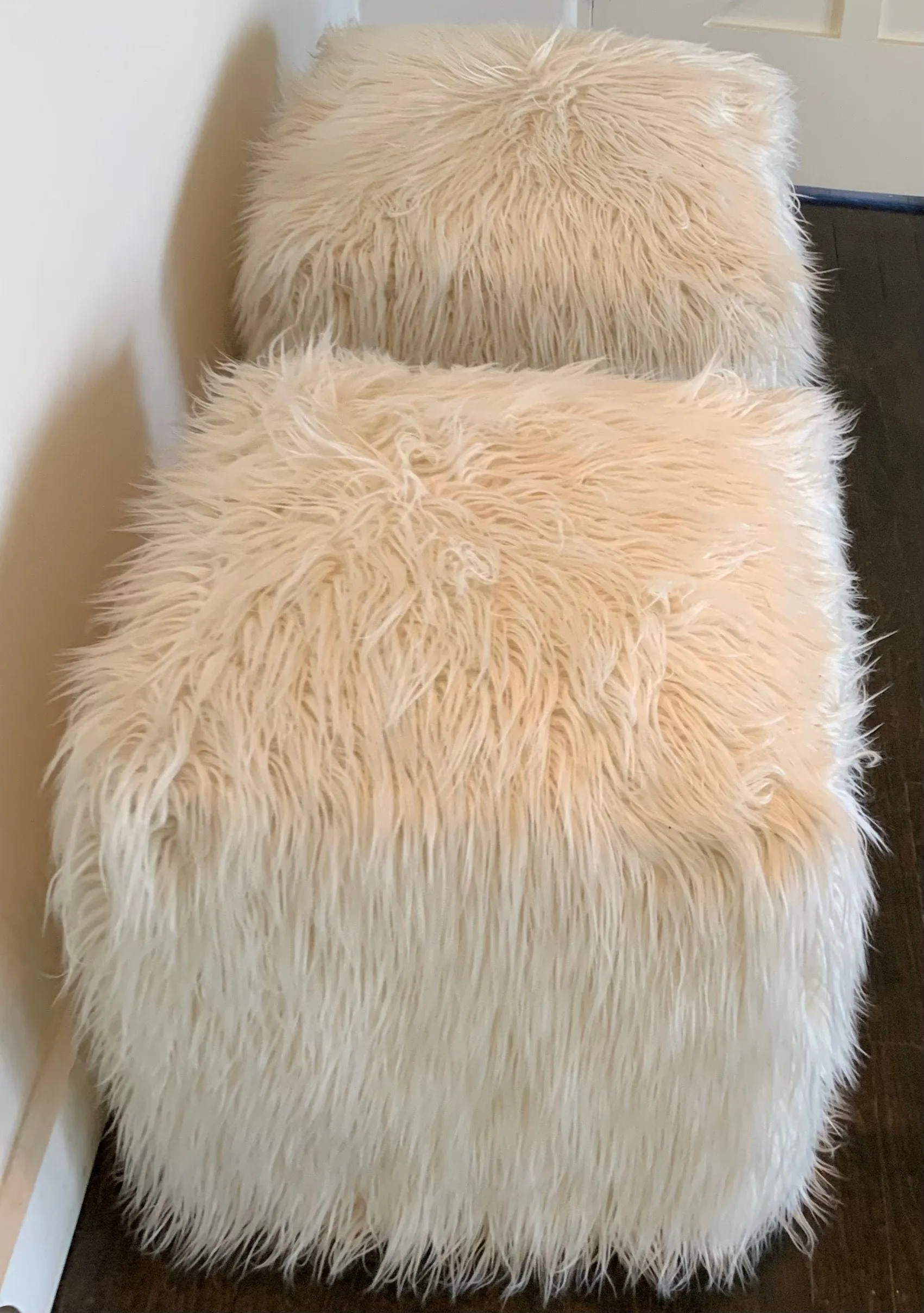 Pair of vintage faux fur poufs