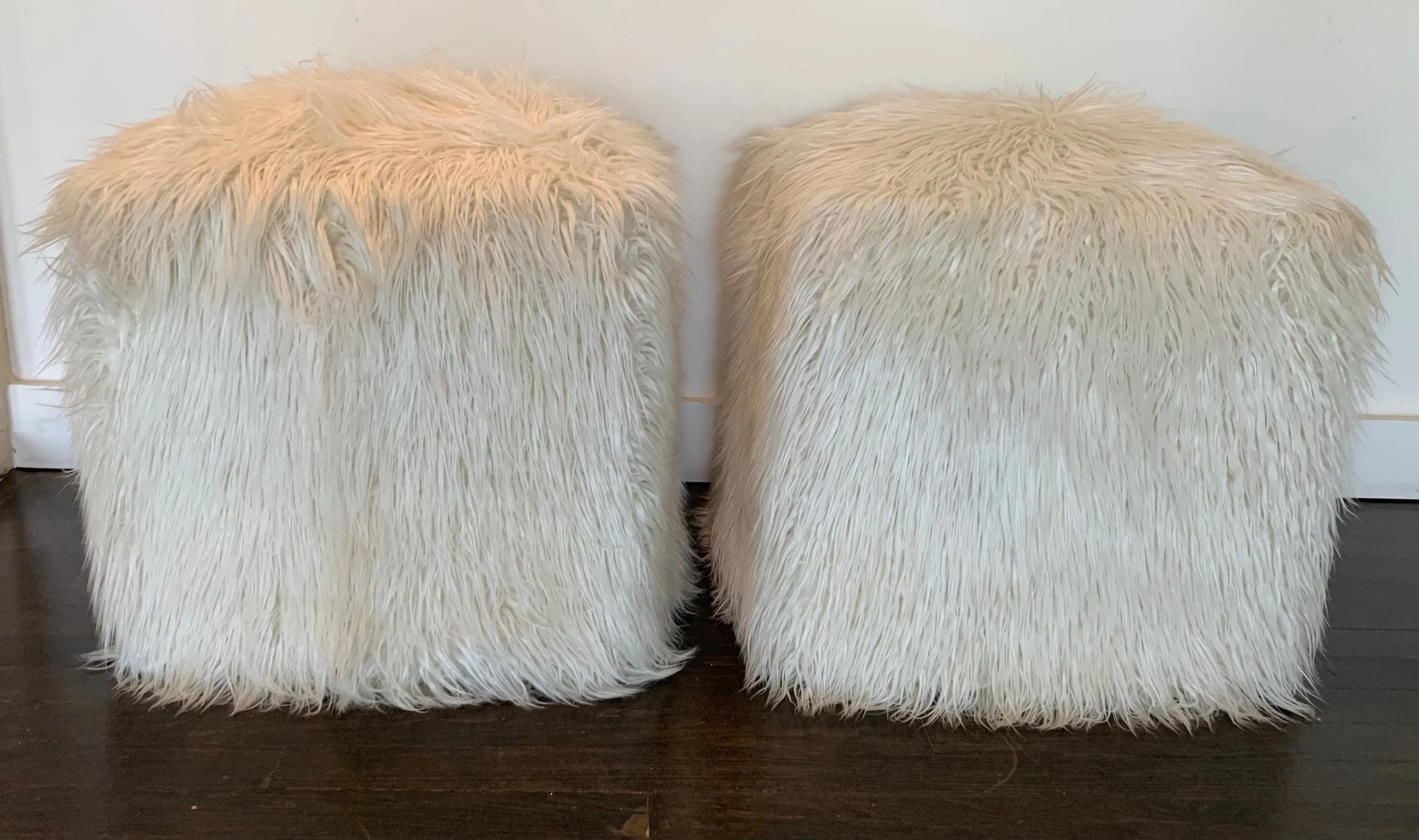 Pair of vintage faux fur poufs