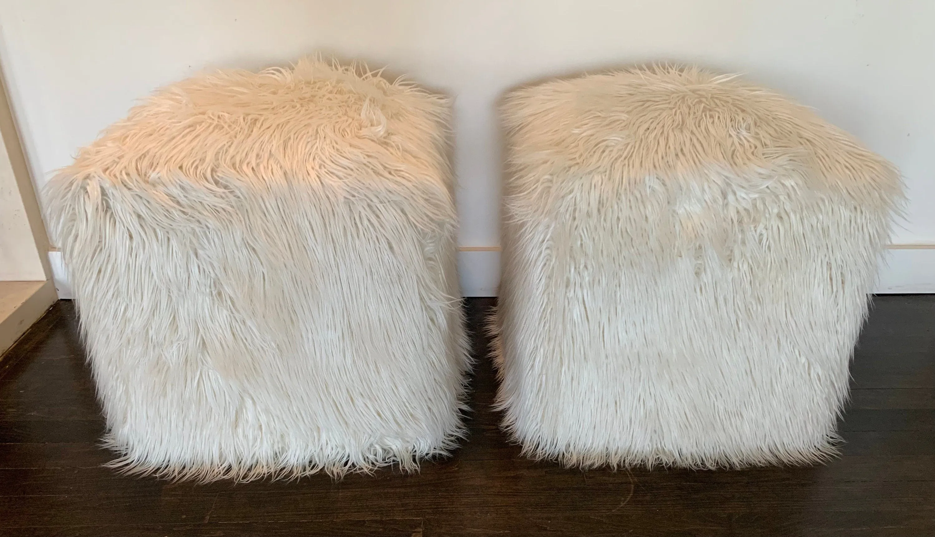 Pair of vintage faux fur poufs