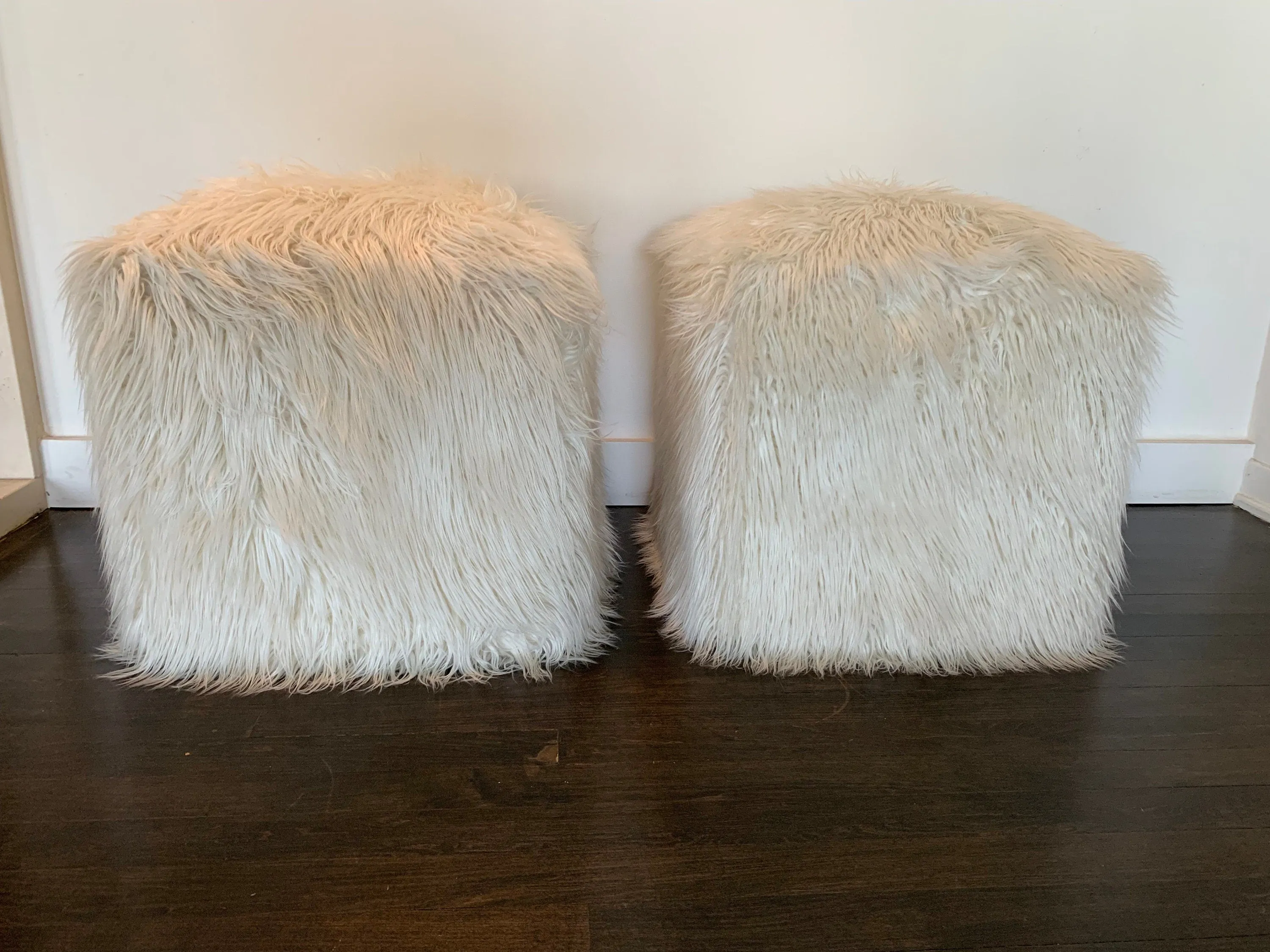 Pair of vintage faux fur poufs